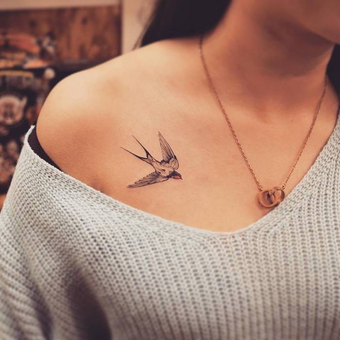 bird chest tattoos for women