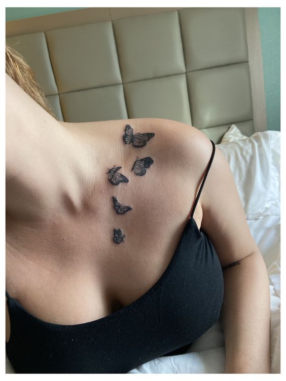 butterfly chest tattoos for females