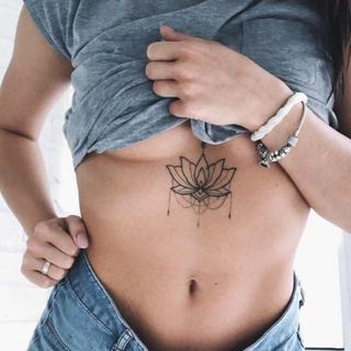 lotus chest tattoos for women