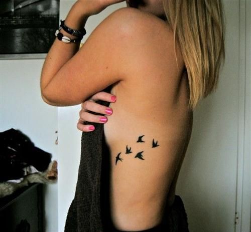 birds rib tattoos for women