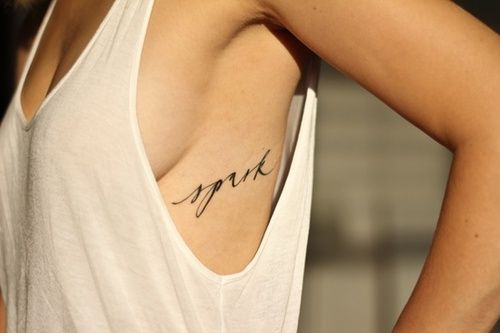 designer rib tattoos for women