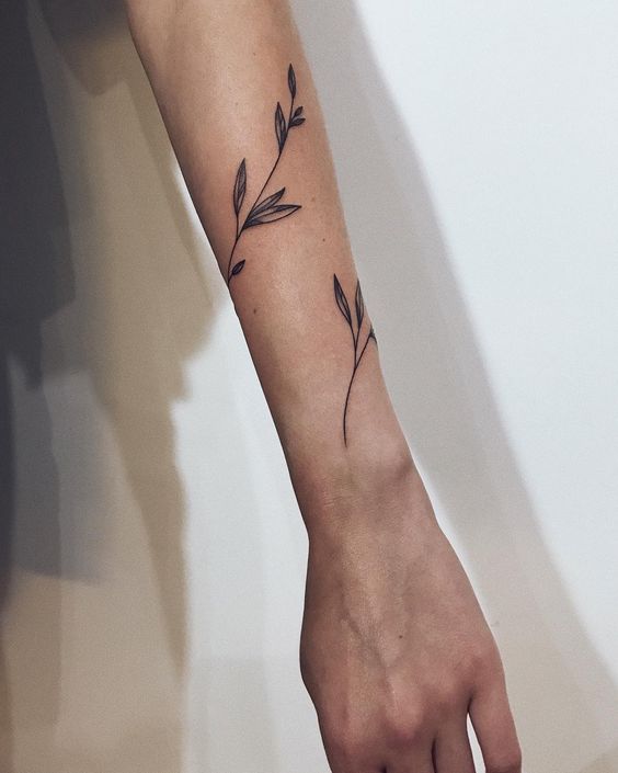 leaves forearm tattoo for women