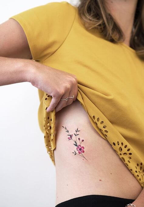 rib cage tattoos for women