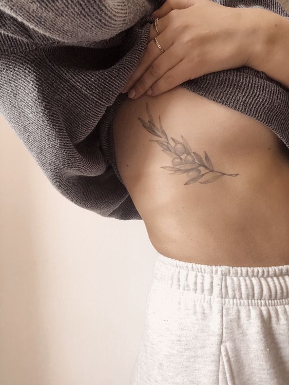 rib tattoos for females 4