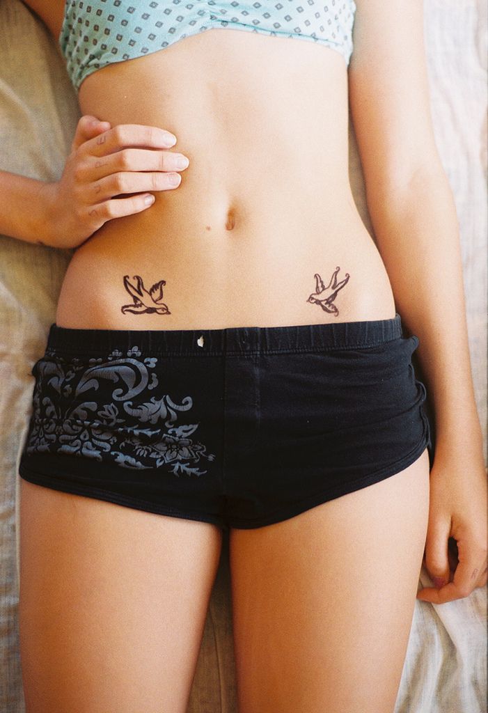 stomach tattoos for girls 9