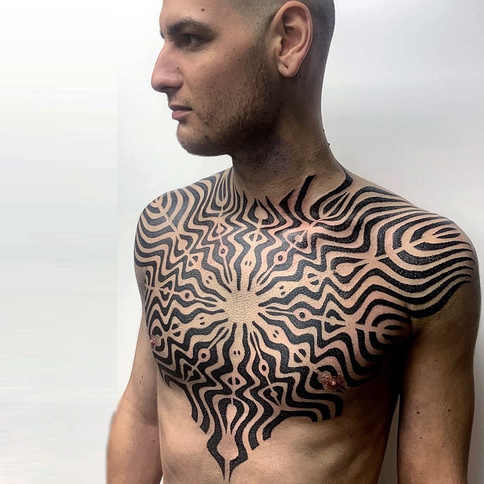 Pattern-mens-chest-tattoo