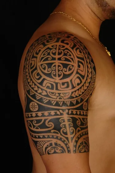 polynesian shoulder tattoos for men