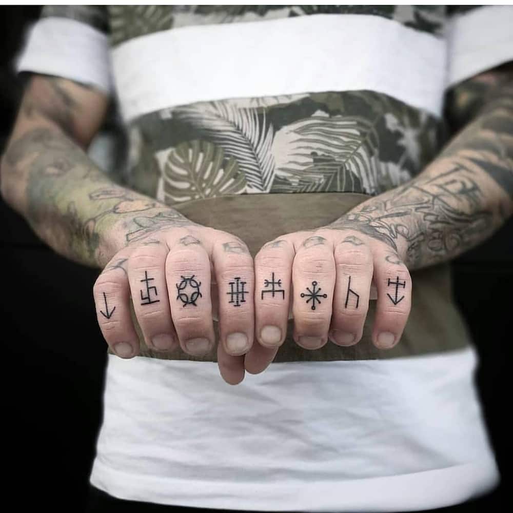 symbolic Finger Tattoos men