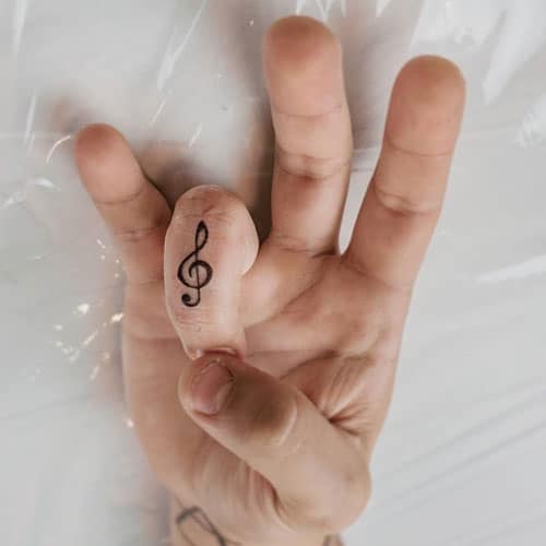 Simple-Musical-Tattoo-on-Hand