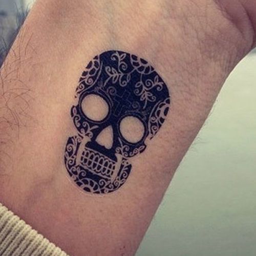 unique design wrist tattoo for men