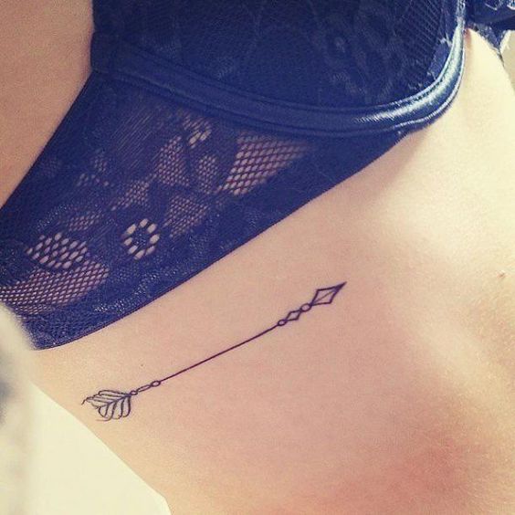 arrow tattoo on ribs