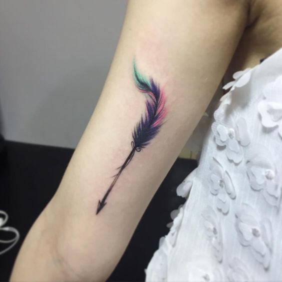 colorful arrow tattoo with fur