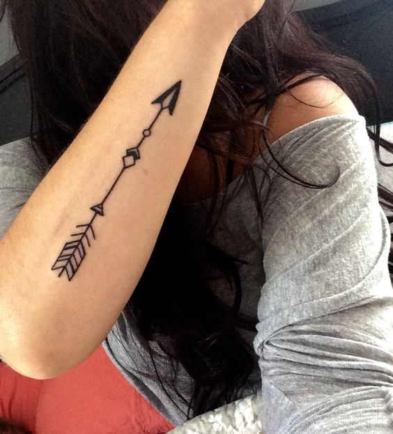 dark big arrow tattoo