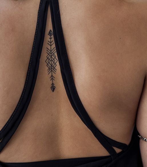 geometric shape arrow tattoo