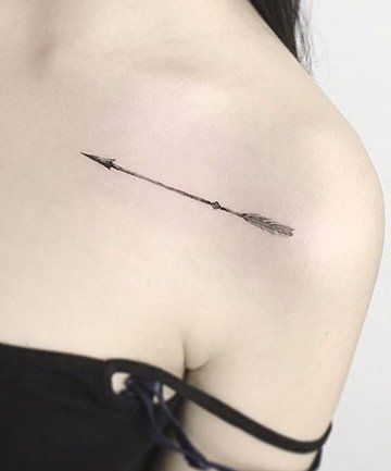 slim stylish arrow tattoo