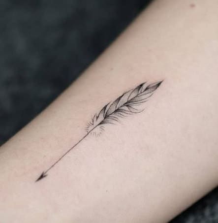 tiny arrow tattoo with fur
