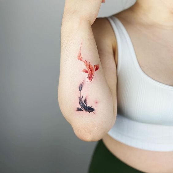 koi fish tattoo on hand