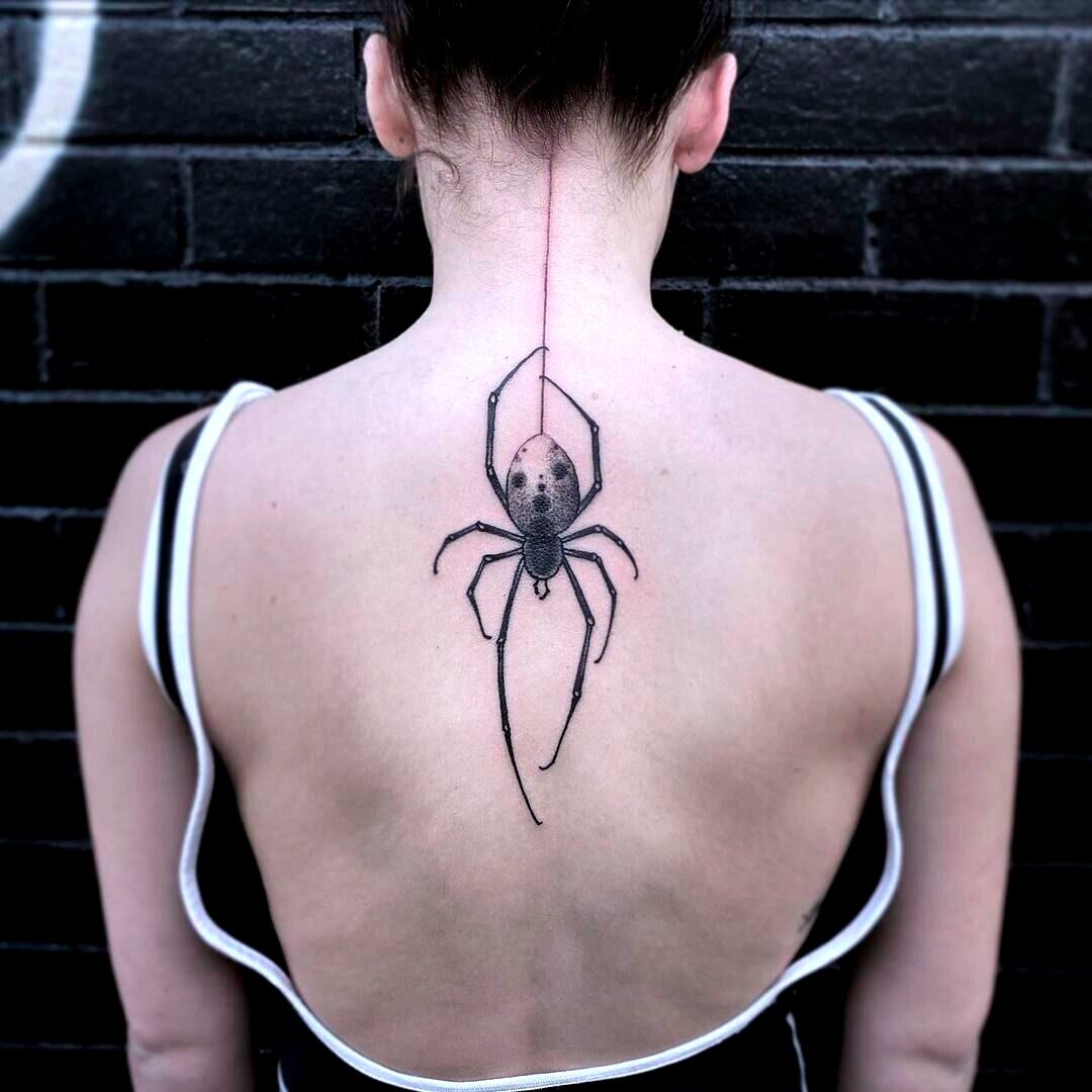 spider tattoo design on back for women