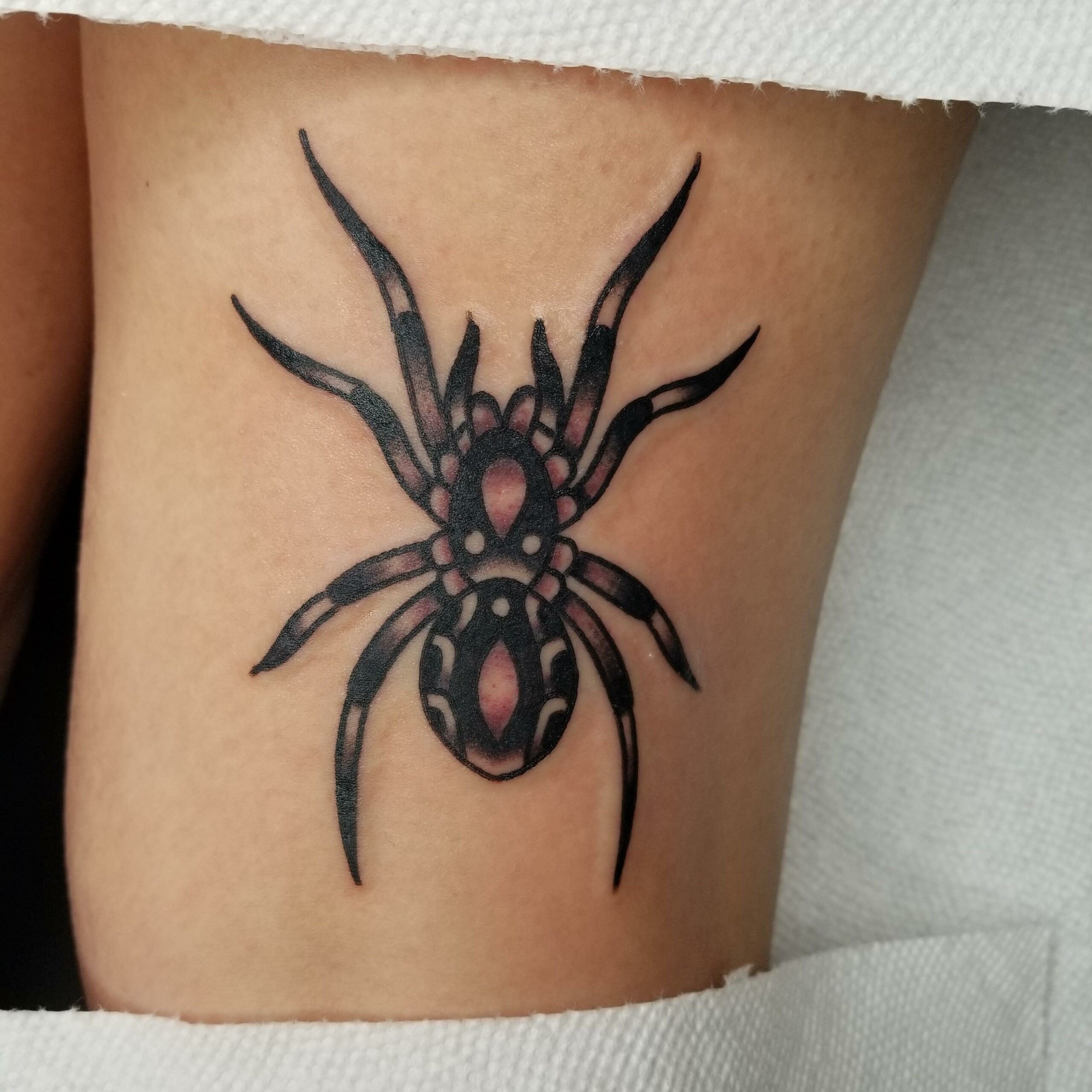 spider tattoo for girls on leg