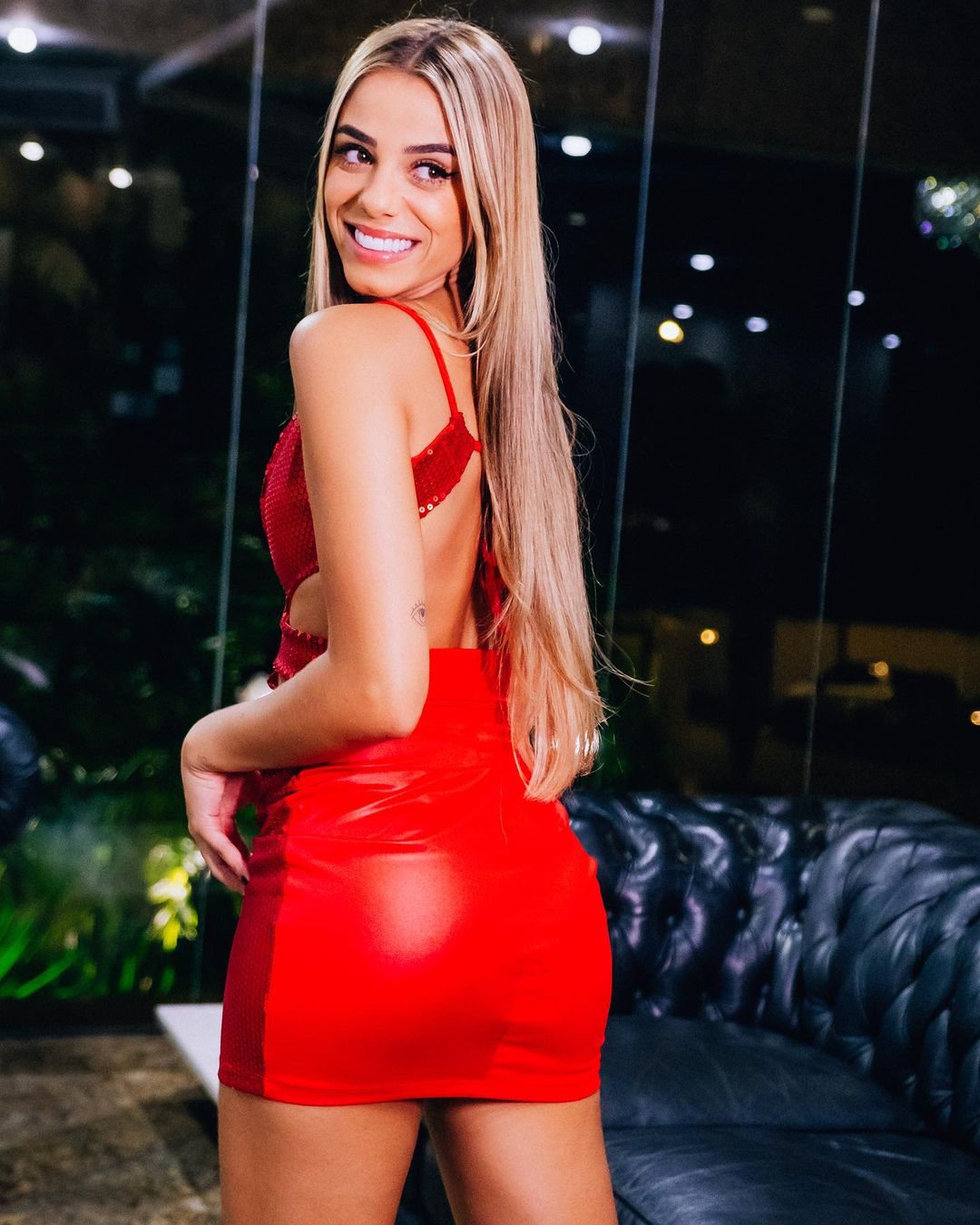 Key Alves in hot red dress