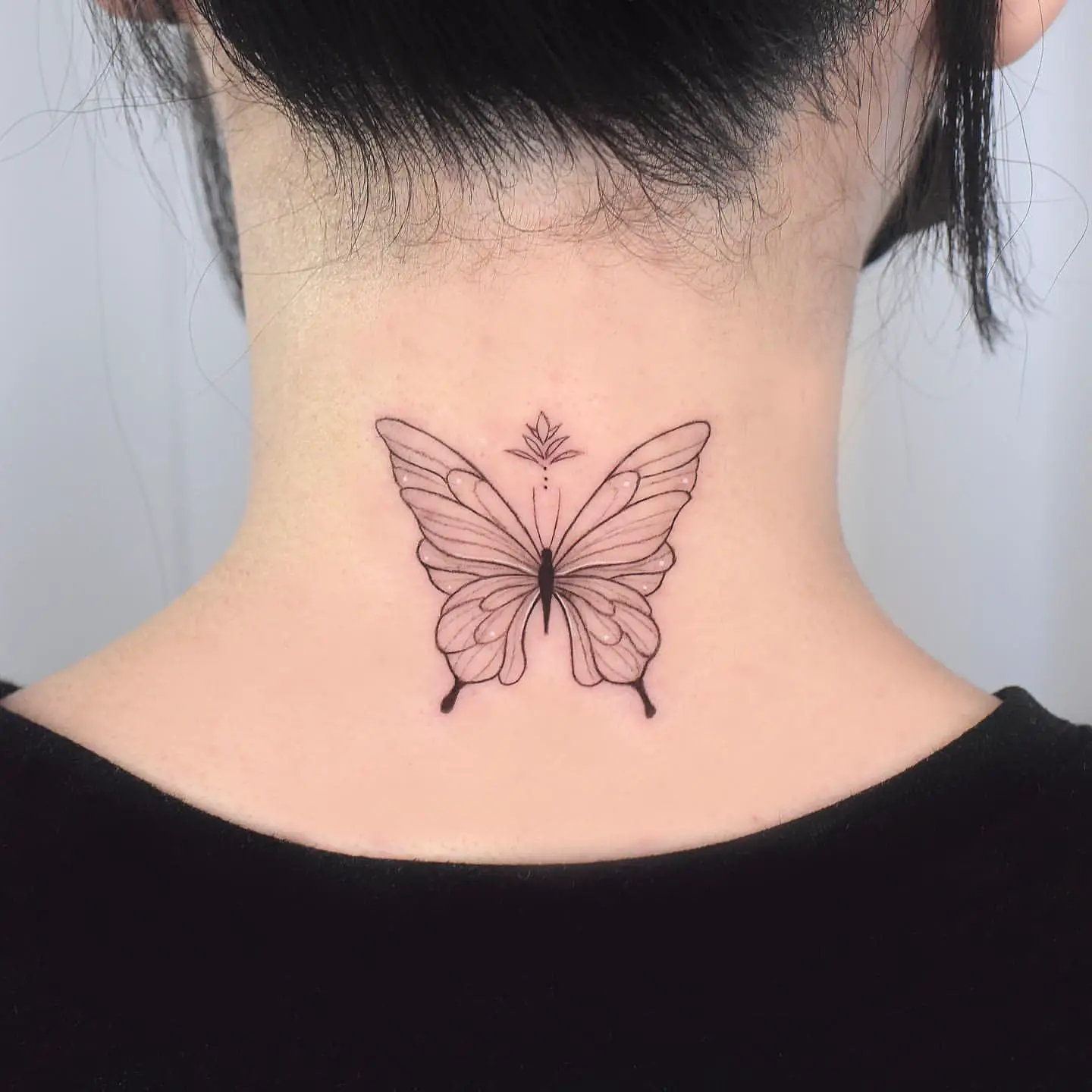 Beautiful Linework Butterfly Tattoo at Nape of Neck This butterfly is so beautiful it e