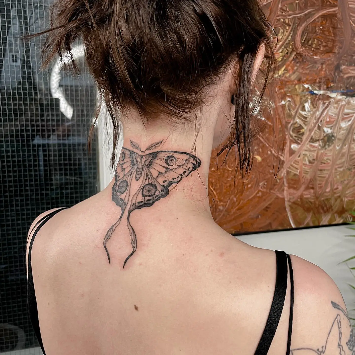 Large Black and Gray Moth Tattoo on Back of Neck
