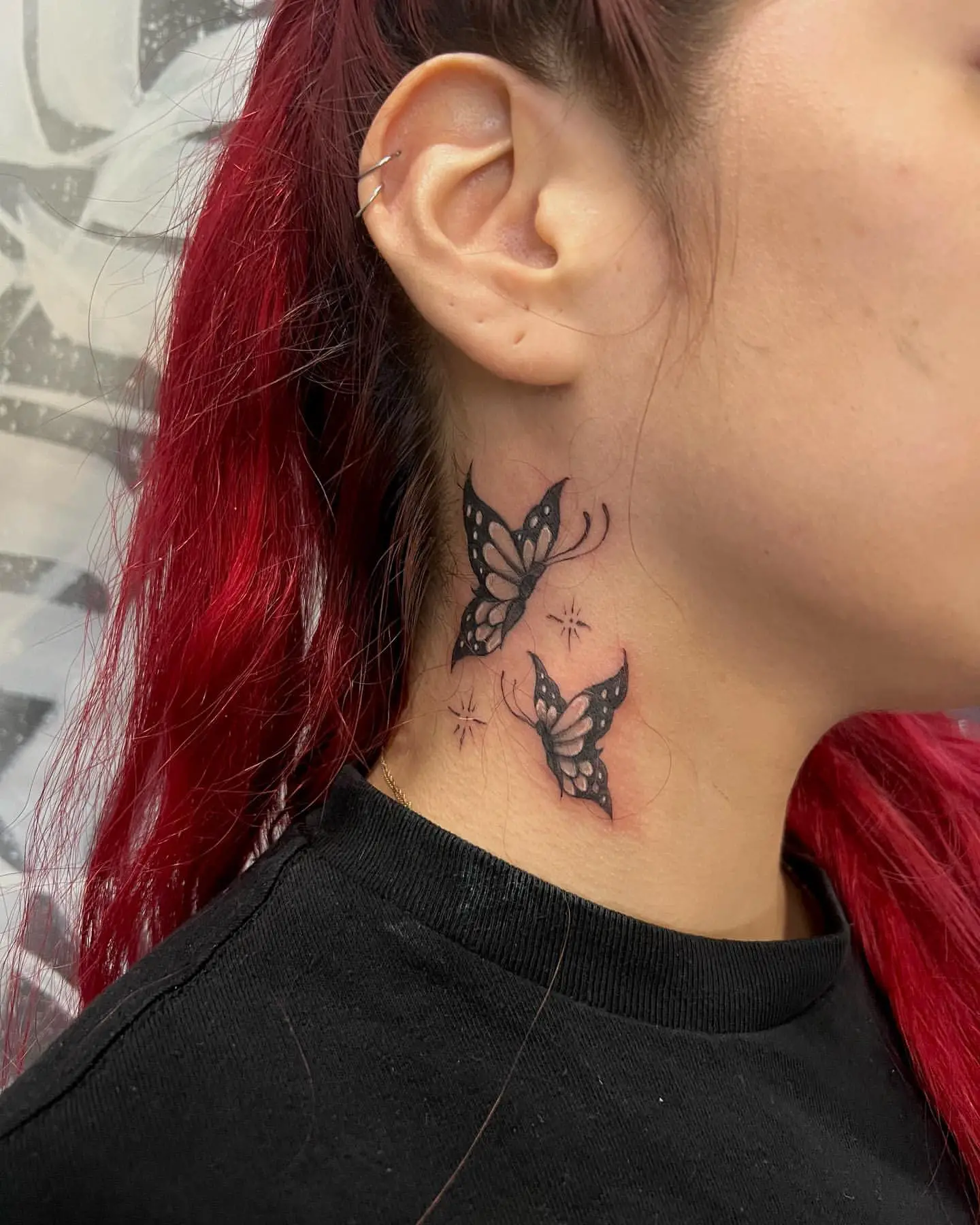 Minimal Butterfly Tattoos on Woman’s Neck