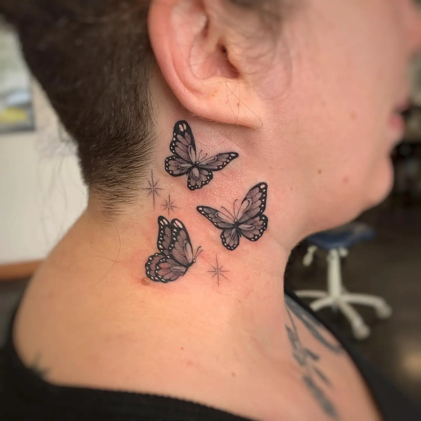 butterfly neck tattoo 1