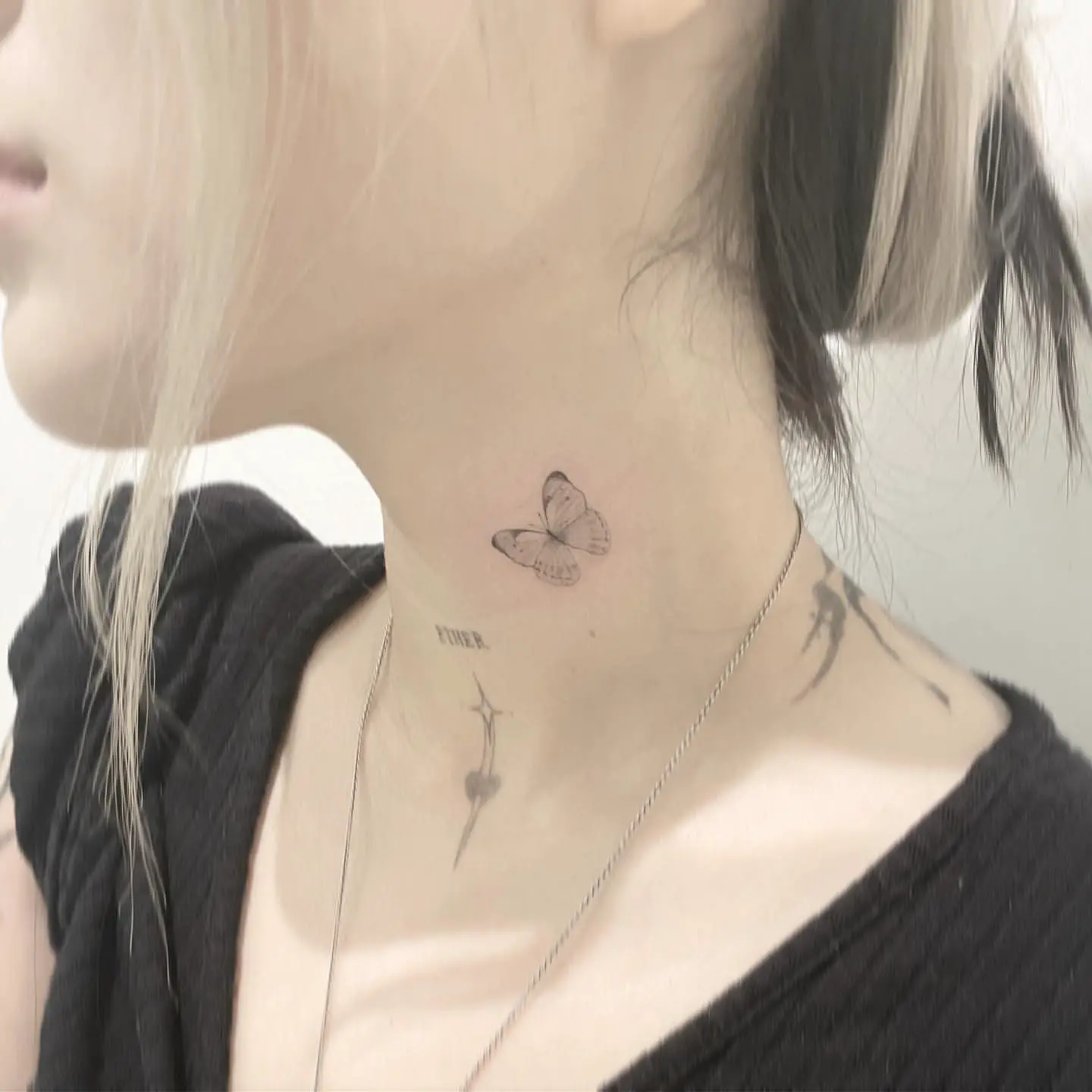 butterfly neck tattoo 3